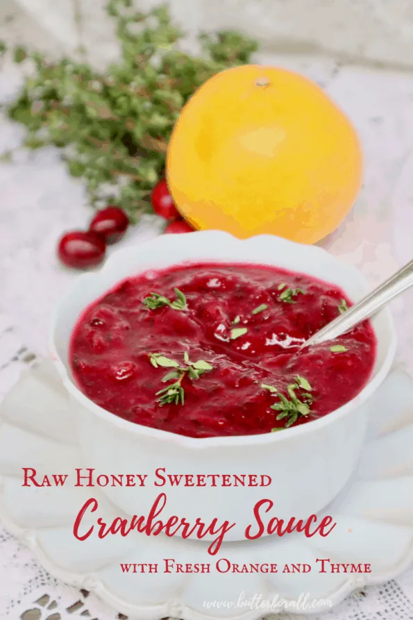 Pinterest image showing one bowl of fresh, bright red cranberry sauce with a text overlay.