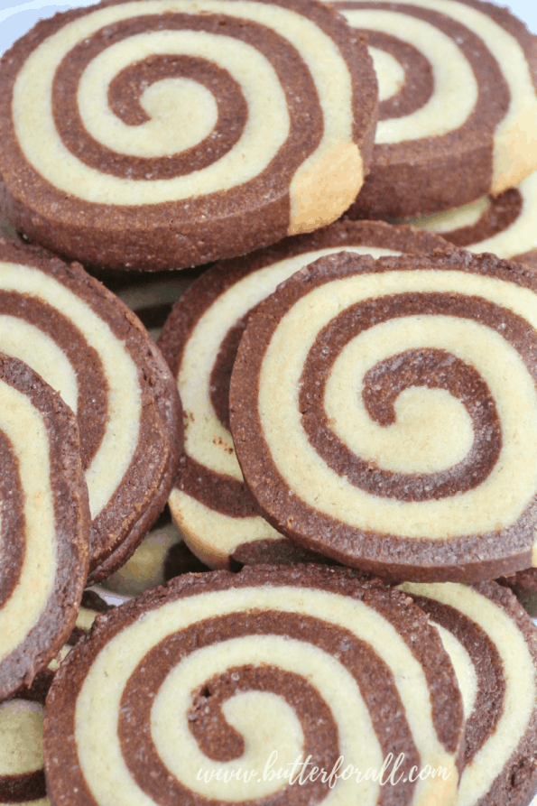 Close-up of the peppermint pinwheel cookies and their perfect chocolate and peppermint swirls.