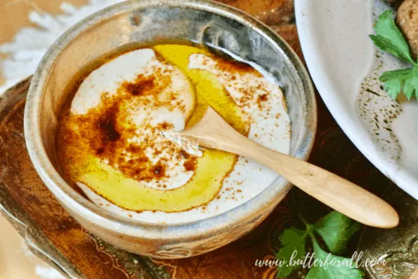 Tahini dressing with an olive oil swirl.