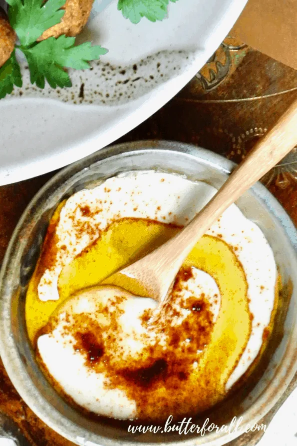 Tahini dressing with olive oil and spices.