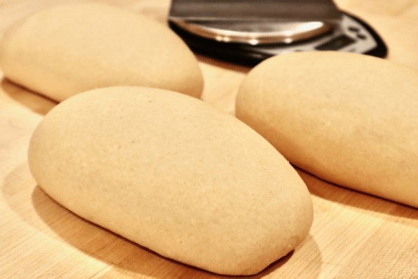 Three unbaked loaves of smooth Kamut dough.