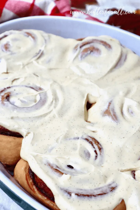 Giant cinnamon rolls with cream cheese frosting melted down between the layers.