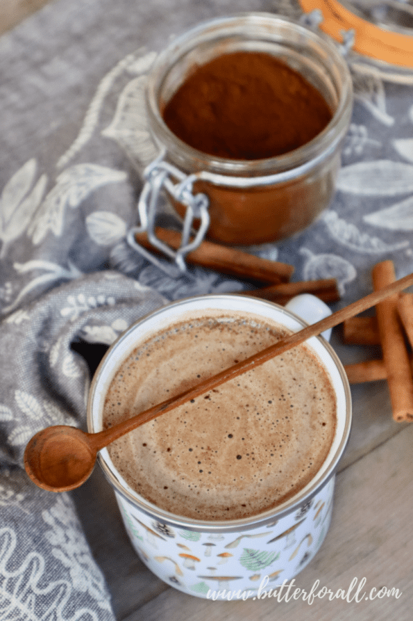 The creamy swirls in a top view of a mug full of mushroom hot chocolate.