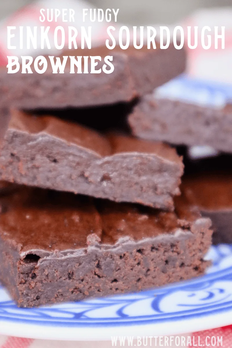 Close up of a stack of sourdough unicorn brownies and their fudgy centers. Text overlay.