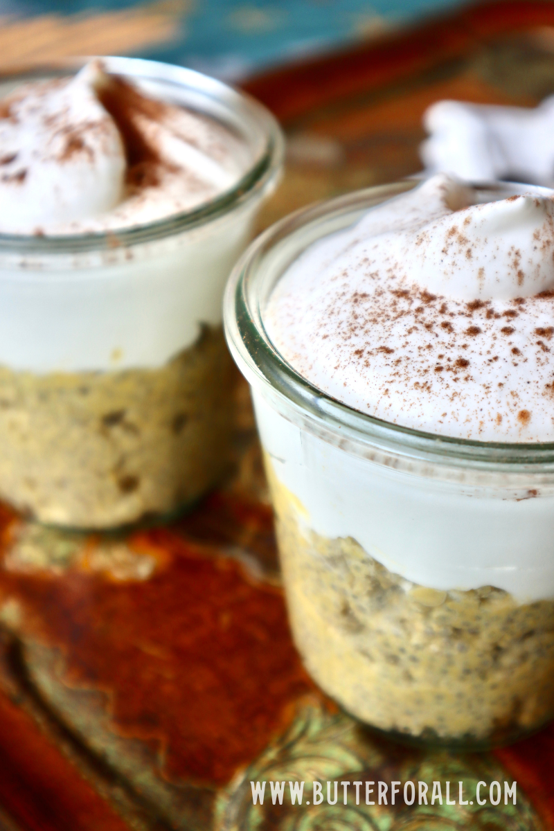 Two jars of pumpkin spice, Chia seed pudding with whipped cream and cinnamon on top.